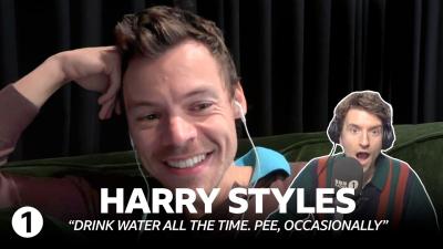 Harry Styles on the Pope parking fans cars  album titles  Kiss All The Time. Disco Occasionally