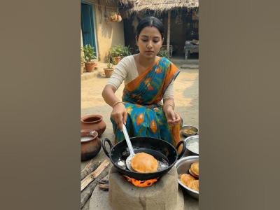 Traditional pitha fried in the village courtyard  shorts cooking recipe PithaRecipe