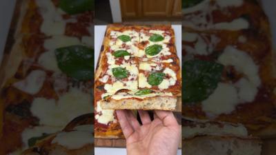 Easy pizza recipe for your home oven recipe in the comments 