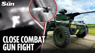 Moment machine gun robot fights Russian soldier in deserted town as Ukraine retakes land