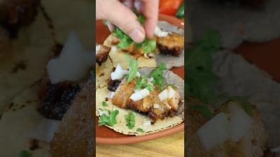 Pork belly tacos with mango habanero salsa. Get my cookbook with link in bio. recipe
