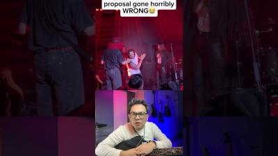propose to a woman on a live music stage